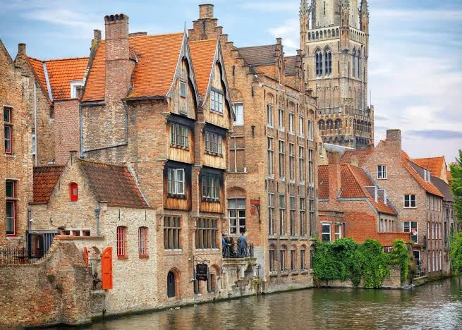 Historic canal-side buildings in Bruges, Belgium