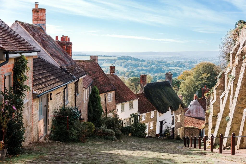 Historic village street in Dorset with countryside views